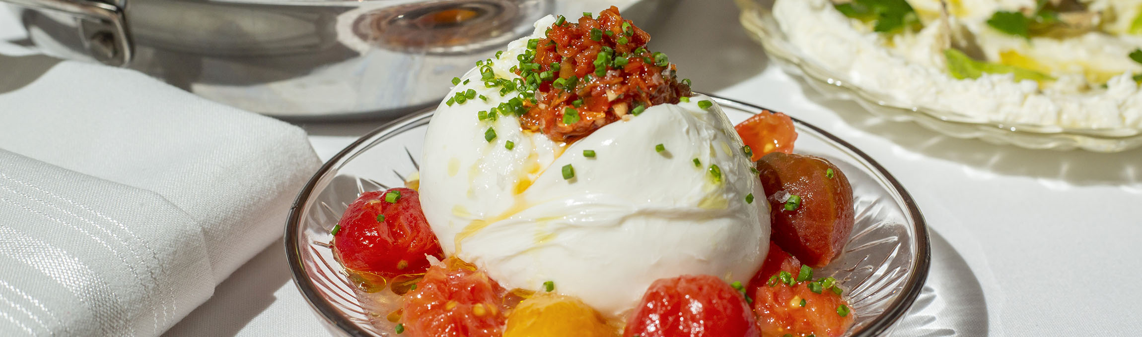 Burrata with roasted tomato pesto served at Cento italian restaurant in Columbus, Ohio's German Village neighborhood.